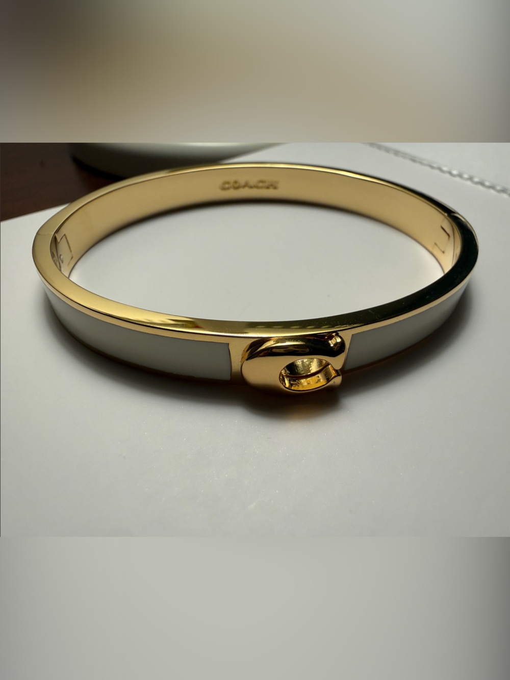 COACH Gold-Tone and Cream Enamel Hinged Bangle Bracelet